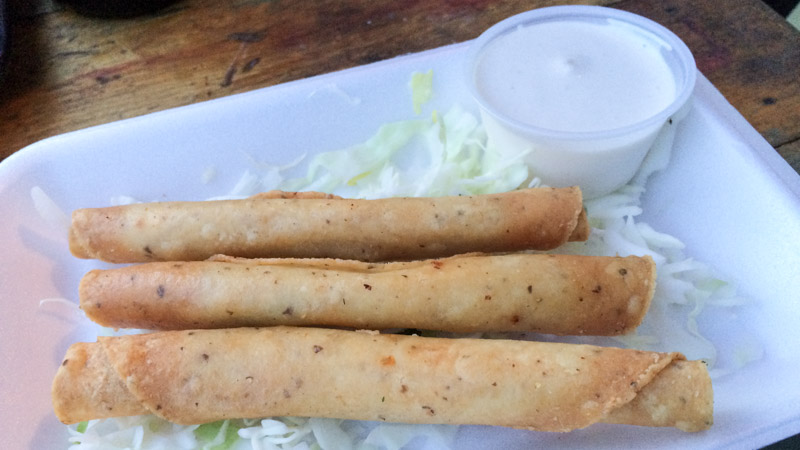 Fish taquitos with a side of the white sauce