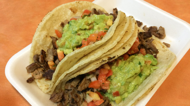 Carne Asada Tacos packed with guacamole
